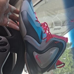 Nike High-Top Sneakers with Blue and Pink Highlights